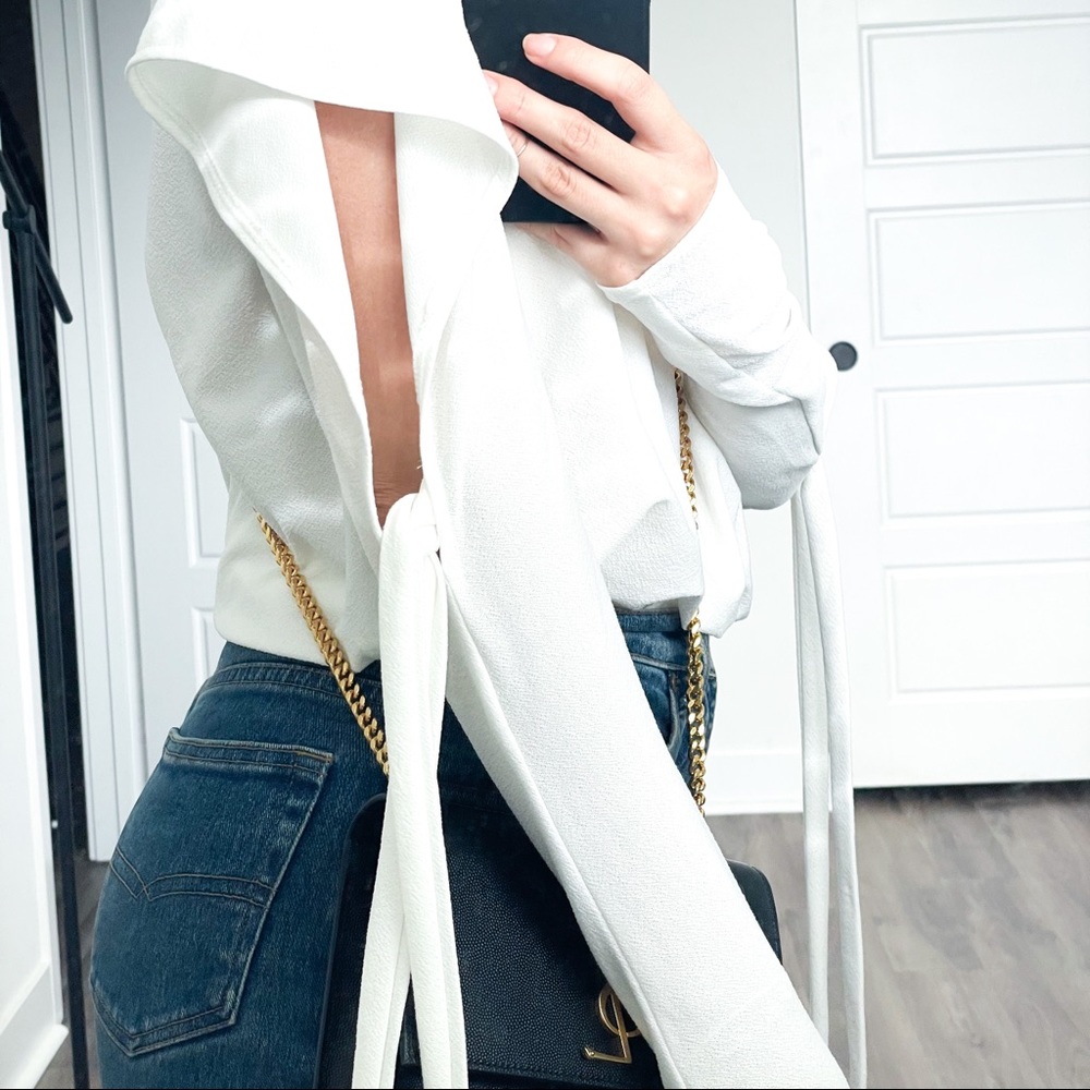 White shirt with open arm details and ties